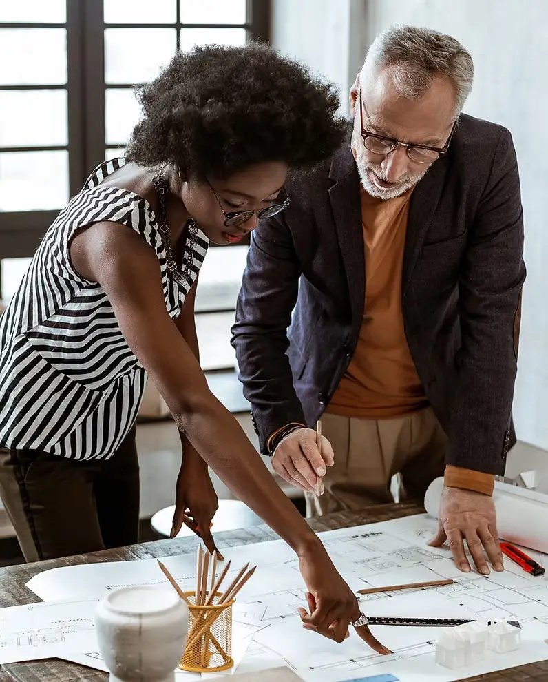 A Man and a Woman looking at a Design (1)